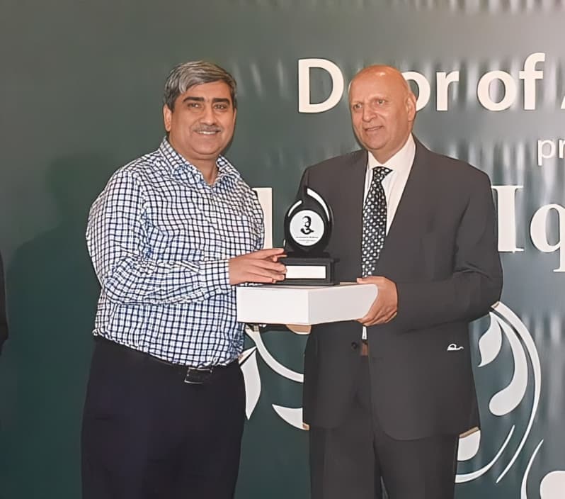 Receiving Award from Governor Punjab