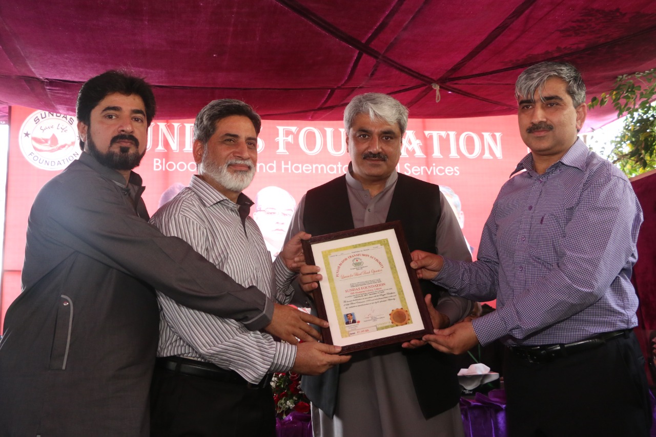 Receiving Certificate from EX. Health Minister Khawja Salman Raffique