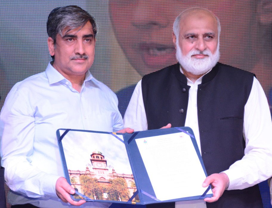 Receiving a Souvenir from Vice Chancellor University of Punjab